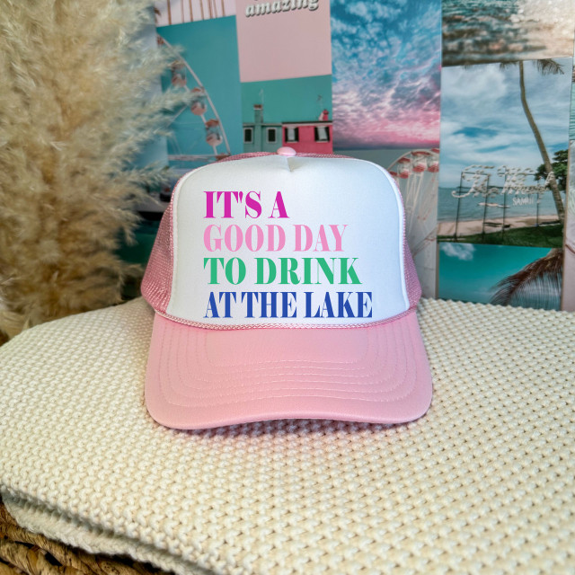 It's A Good Day To Drink At The Lake DTF Heat Transfer, pink and white trucker hat with colorful text design.
