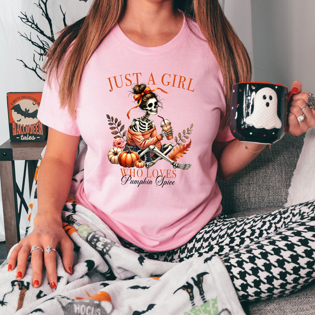Just A Girl Who Loves Pumpkin Spice Skeleton DTF Heat Transfer T-Shirt with Halloween skeleton design, pumpkins, and fall leaves.