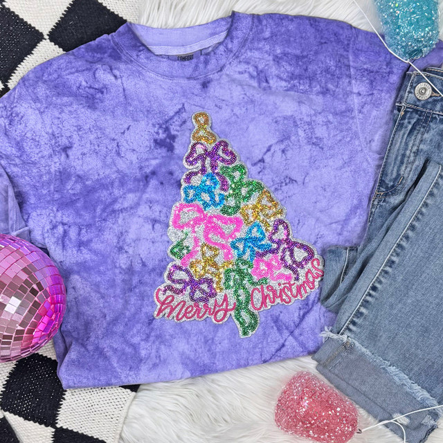 Merry Christmas Bow Tree Sequin Patch, festive purple tie-dye T-shirt with colorful sequin bow-shaped Christmas tree design and Merry Christmas text.