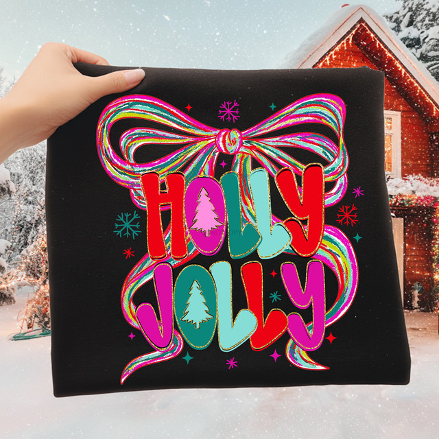 Bright Holly Jolly Bow DTF Heat Transfer, colorful decorative bow with the words 'Holly Jolly' and Christmas trees on a black background for holiday apparel.