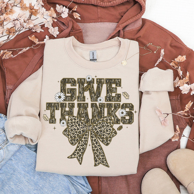 Camo Give Thanks Leopard Bow DTF Heat Transfer, fall season decorative sweatshirt with leopard print bow and thankfulness message.