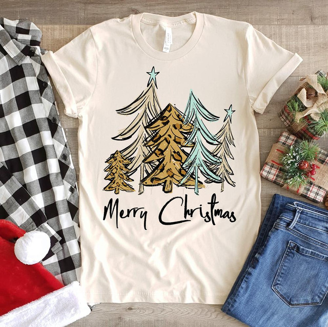 Merry Christmas Teal and Leopard Trees Screen Print Heat Transfer,Christmas trees in leopard and teal colors with 'Merry Christmas' text on a white T-shirt.