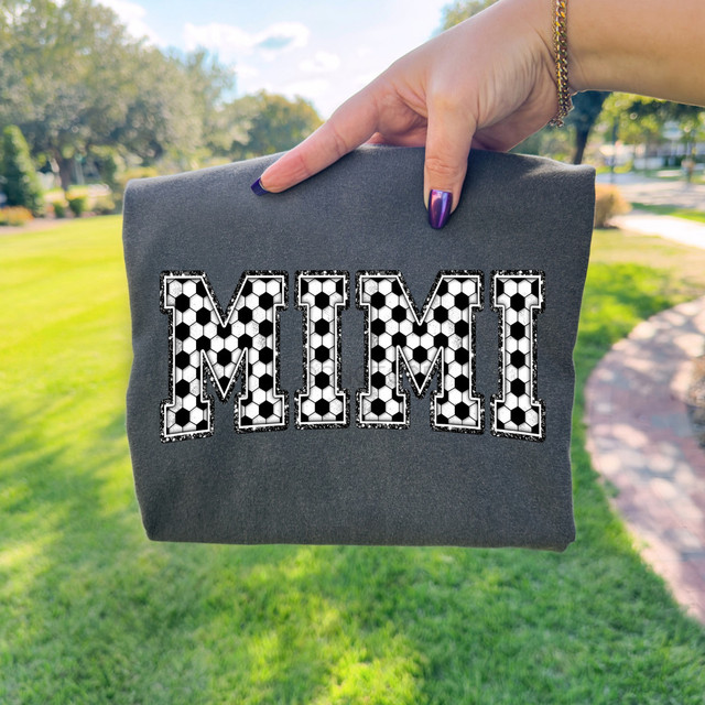 Soccer Patterned Mimi DTF Heat Transfer, a soccer-themed design with black and white soccer ball pattern for custom apparel.