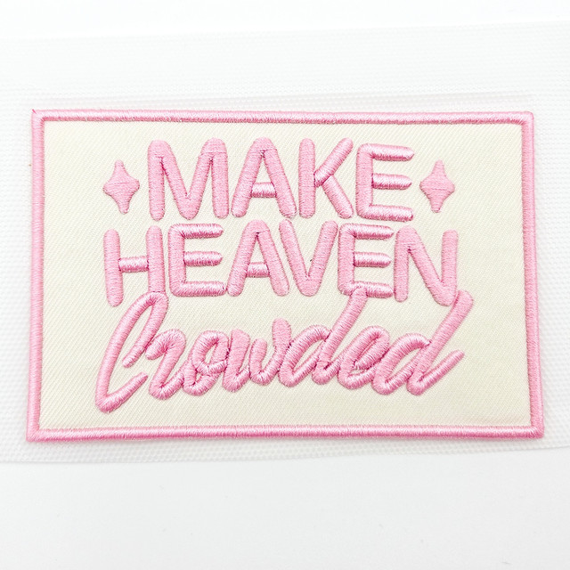 Make Heaven Crowded PUFF Embroidered HAT/POCKET Patch, pink embroidered patch with the quote 'Make Heaven Crowded' and decorative star shapes.