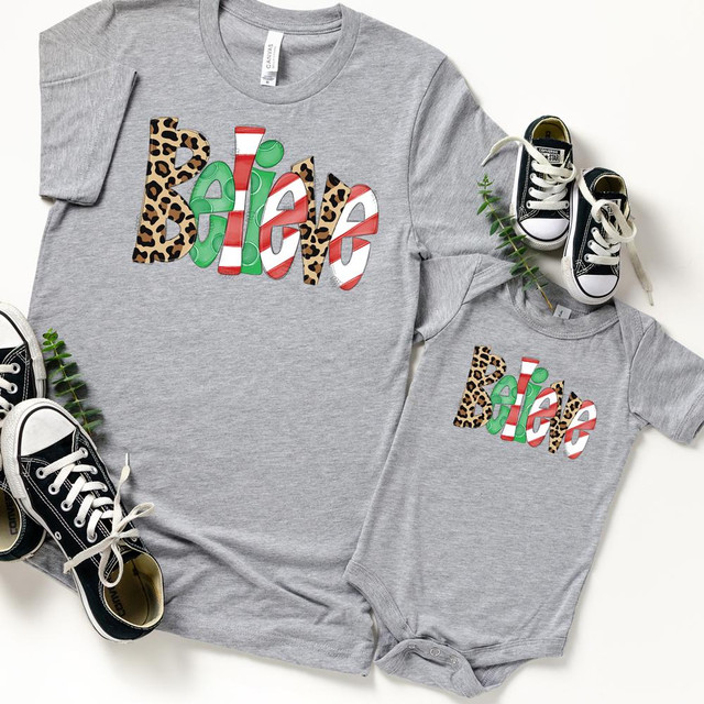 Believe YOUTH Screen Print Heat Transfer, image of a grey T-shirt with a colorful leopard and striped pattern text design, alongside a matching baby onesie and small black sneakers.