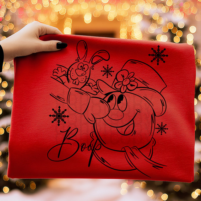 Boop Frosty BLACK DTF Heat Transfer, a red transfer with a cartoon rabbit and snowflake designs, ready for heat pressing onto fabric for festive holiday decorating.