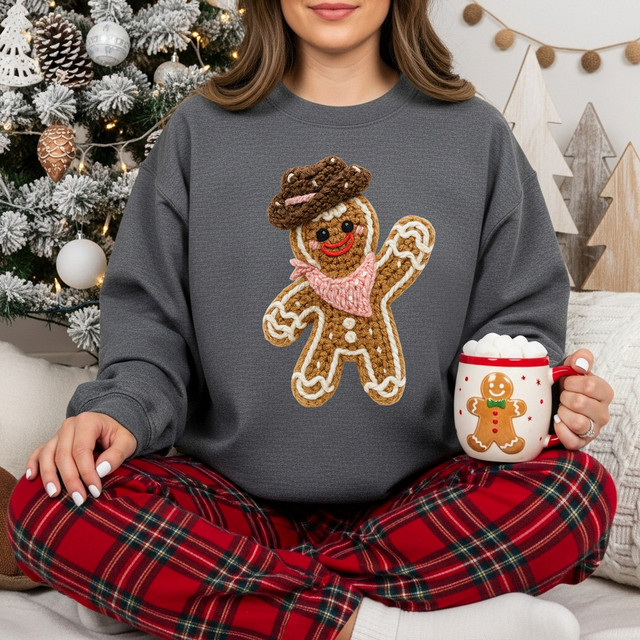 Faux Yarn Western Gingerbread DTF Heat Transfer, holiday-themed gingerbread man design embroidered on a gray sweatshirt.