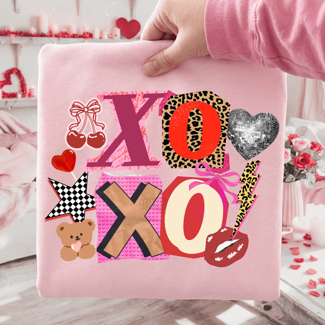 XOXO Mixed Retro Patterns DTF Heat Transfer, colorful and playful design with various patterns including heart, star, teddy bear, lipstick, and animal prints on a pink fabric background.