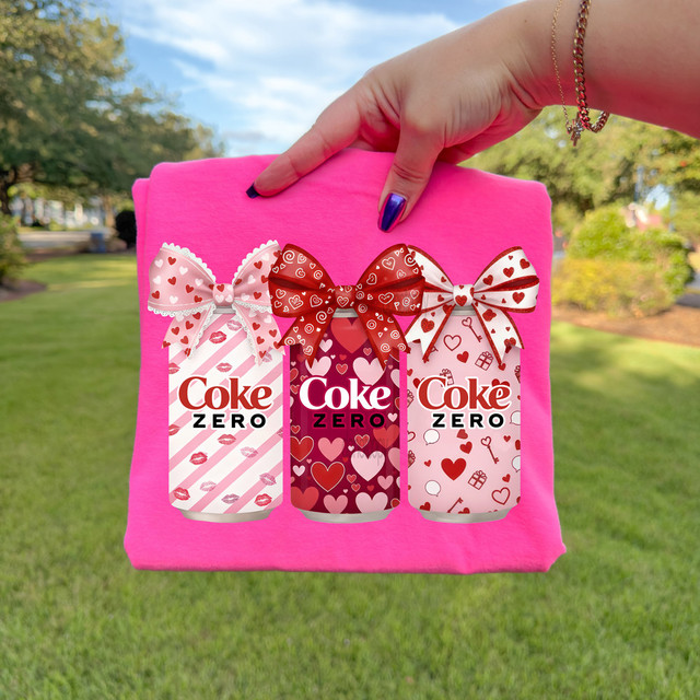 Cola Zero Valentine Cans DTF Heat Transfer, featuring three Coca-Cola Zero cans with love-themed ribbons and patterns, used for Valentine's Day gift decoration.