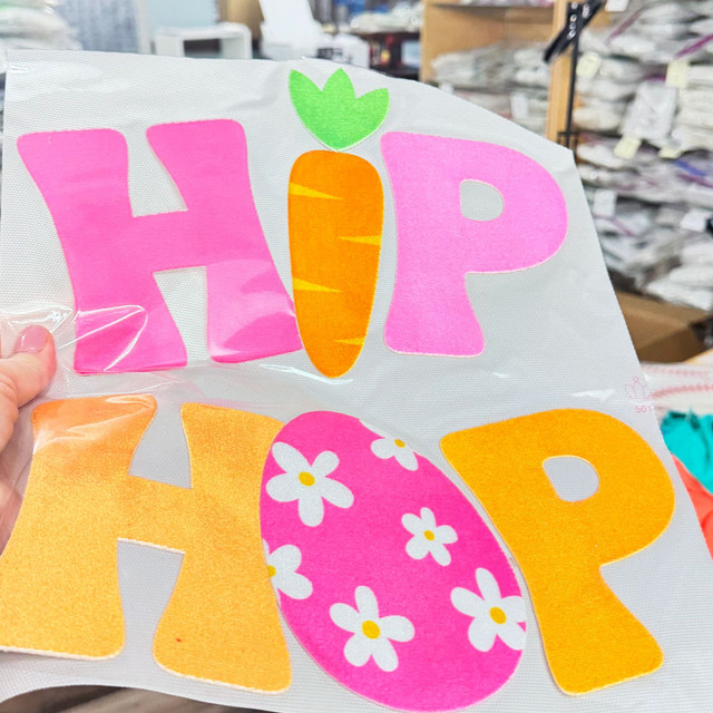 Hip Hop felt fabric patch heat pressed onto an ivory shirt for Easter apparel