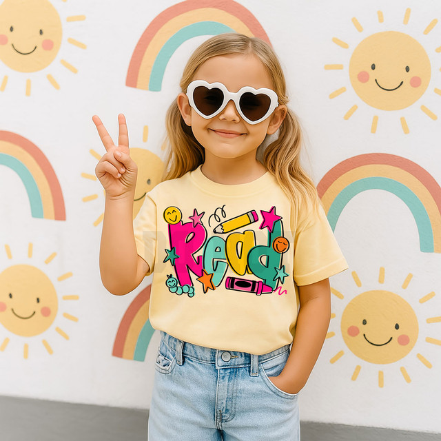 Colorful Read DTF Heat Transfer, young girl wearing sunglasses making peace sign at colorful rainbow and sunshine background.