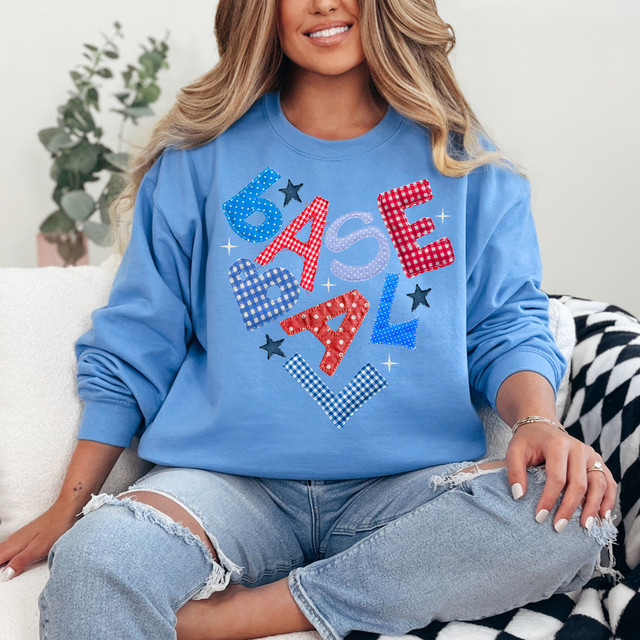 Faux Fabric Patchwork Baseball DTF Heat Transfer, featuring colorful patchwork letters and stars on a blue sweatshirt.