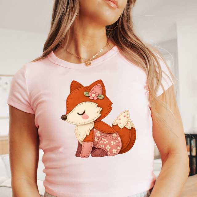 Faux Patchwork Baby Fox DTF Heat Transfer, close-up of a pink t-shirt with an embroidered adorable fox patch designed for crafting and garment embellishment.
