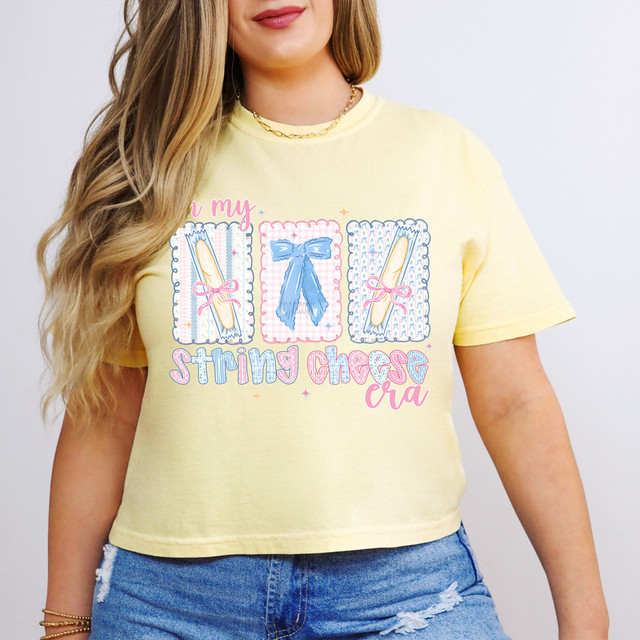 In My String Cheese Era DTF Heat Transfer, colorful graphic design of string cheese illustrations on a yellow t-shirt.