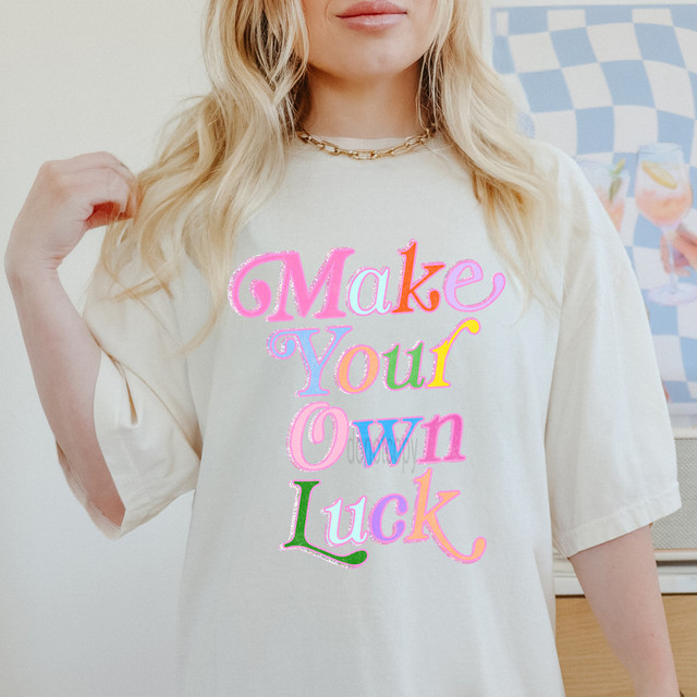 Make Your Own Luck DTF Heat Transfer, colorful and decorative heat transfer design on a white t-shirt