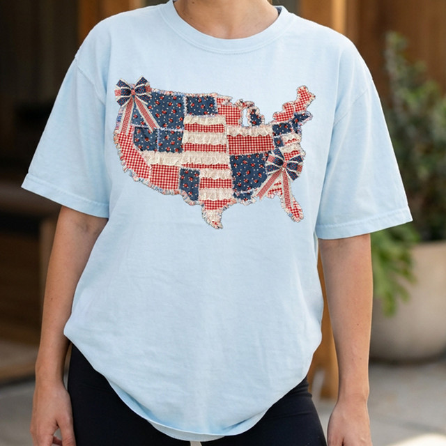 Faux Fabric Patriotic Patchwork USA Map DTF Heat Transfer, patriotic USA map patchwork design on a light blue T-shirt.