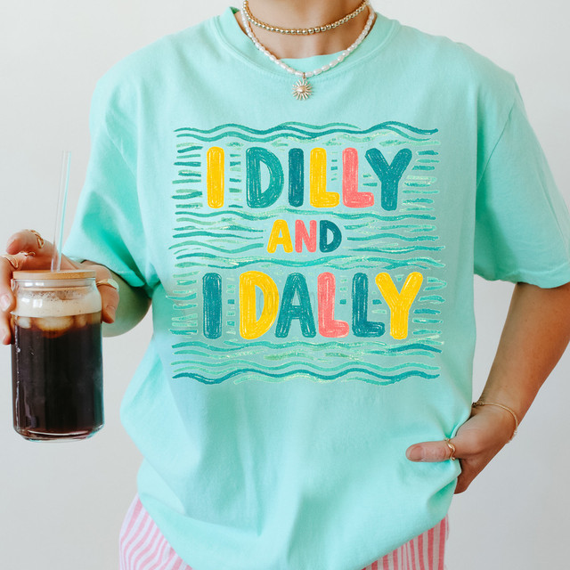I Dilly And I Dally DTF Heat Transfer, colorful graphic design on a mint green t-shirt.