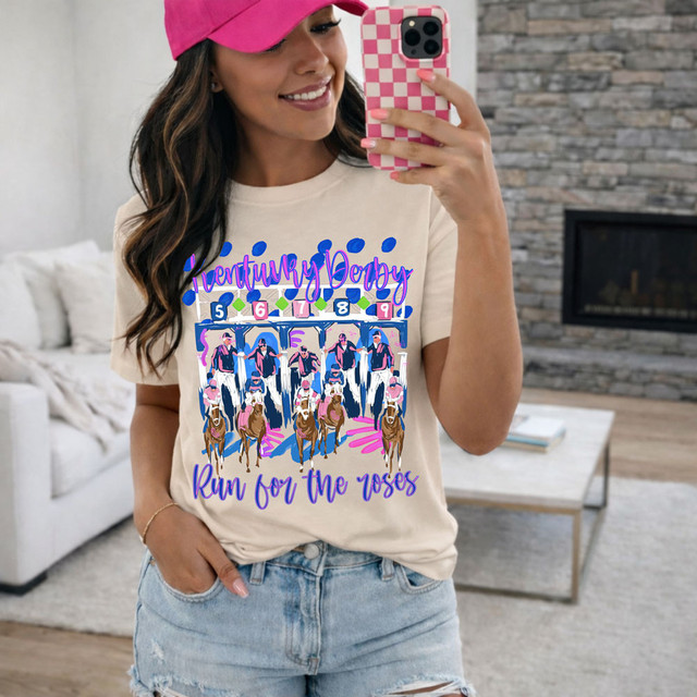 KY Derby Run For The Roses DTF Heat Transfer, woman wearing a race-themed graphic T-shirt featuring horses and jockeys at the Kentucky Derby.