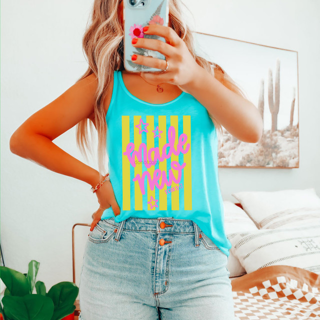 Made New Stripes DTF Heat Transfer, colorful turquoise tank top with pink and yellow graphic design that says "I made new" with stars.