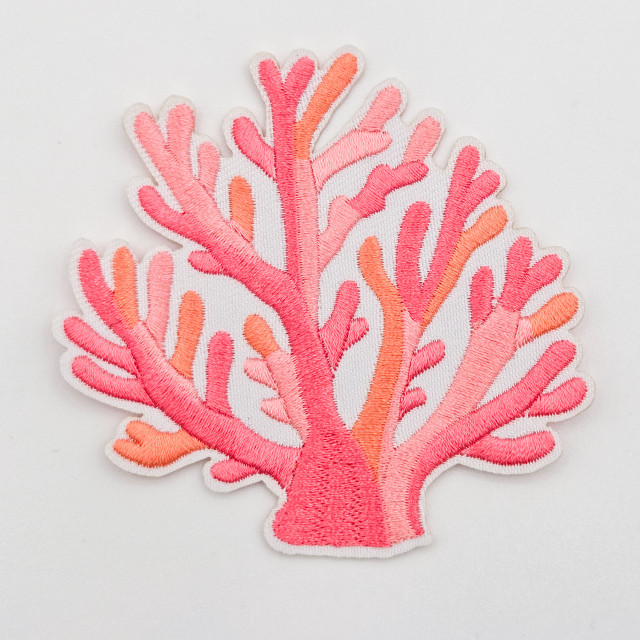 Neon Coral Embroidered HAT/POCKET Patch, colorful coral reef design with vibrant pink and orange embroidery on white fabric.