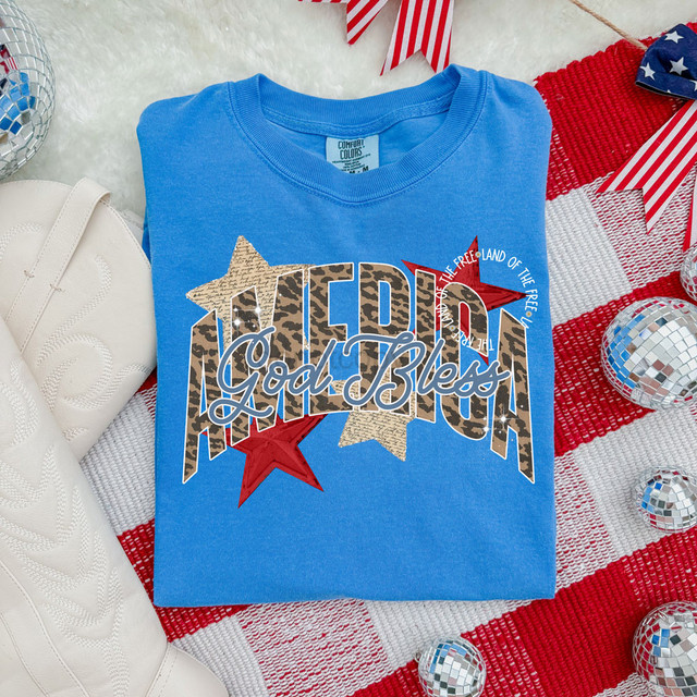 Leopard America DTF Heat Transfer, patriotic t-shirt design with stars and bold text, patriotic American-themed heat transfer for clothing, suitable for DIY apparel decoration.