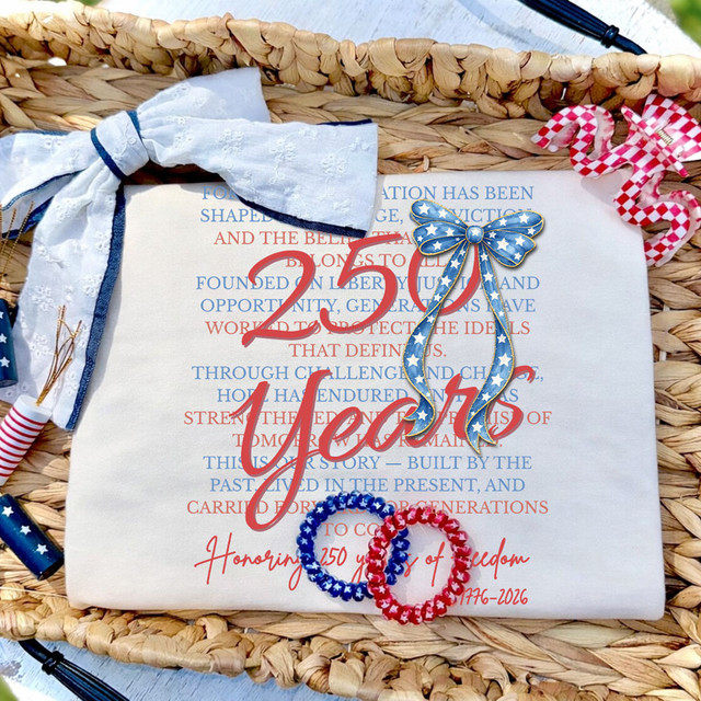 250 Years Bow DTF Heat Transfer, patriotic-themed adhesive flat transfer with a blue star-patterned bow, red and blue rings, and red text celebrating 250 years of freedom.