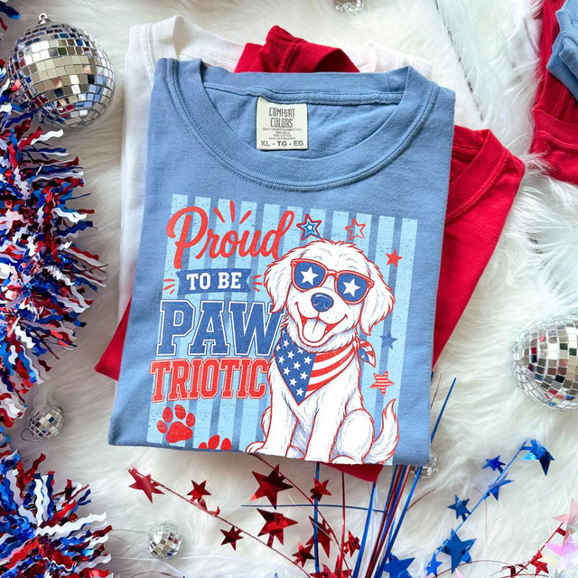 Proud To Be Pawtriotic DTF Heat Transfer T-Shirt with patriotic dog wearing sunglasses and bandana, celebrating American pride with red, white, and blue colors.