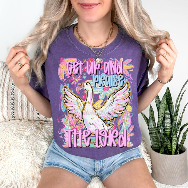 Get Up And Praise The Lord DTF Heat Transfer, colorful graphic t-shirt featuring a white dove and vibrant floral designs.