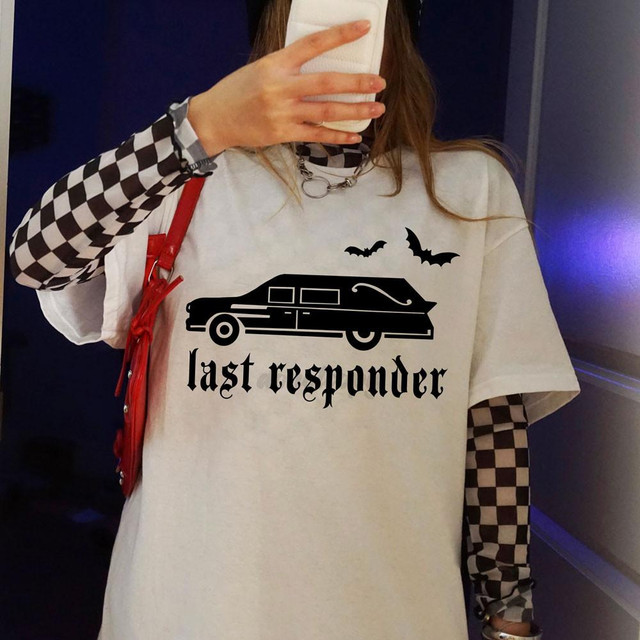 Last Responder BLACK DTF Heat Transfer, black graphic of a hearse with bats and the text 'last responder' on a woman's white t-shirt.