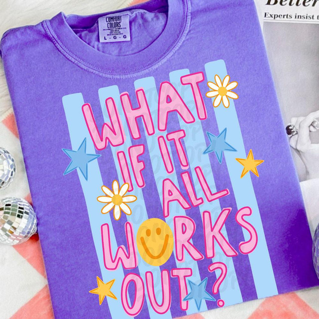 What If It All Works Out DTF Heat Transfer, colorful sweatshirt with pink, blue, yellow, and white design featuring stars, flowers, and a smiley face.