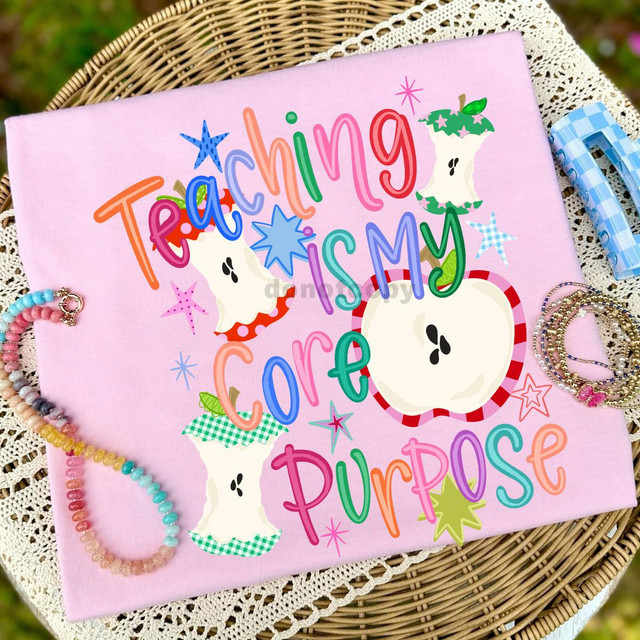 Teaching Is My Core Purpose DTF Heat Transfer, colorful educational graphic with apples and stars on pink fabric for personalized teaching-themed clothing or accessories.
