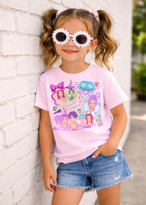 Kpop DTF Heat Transfer, colorful print on a pink children's t-shirt worn by a smiling girl with sunglasses.