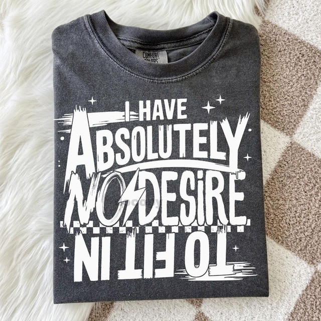 Product I Have Absolutely No Desire To Fit In WHITE DTF Heat Transfer, folded gray t-shirt with white graphic text design and stars.