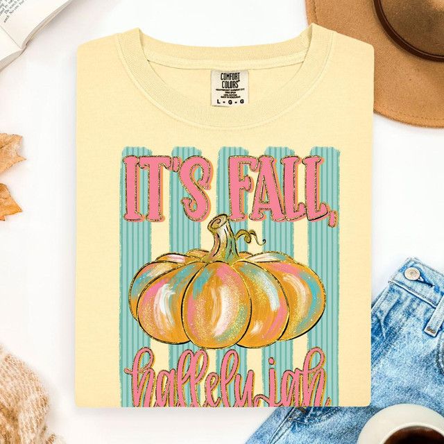 It's Fall, Hallelujah DTF Heat Transfer, colorful pumpkin design on a beige t-shirt.