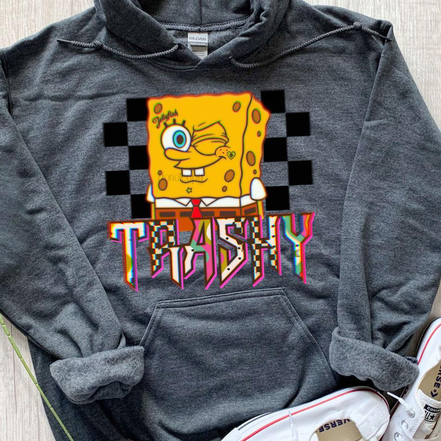 Glitch Trashy DTF Heat Transfer, colorful digital cartoon depiction of SpongeBob SquarePants with distorted glitch effect on a hoodie.