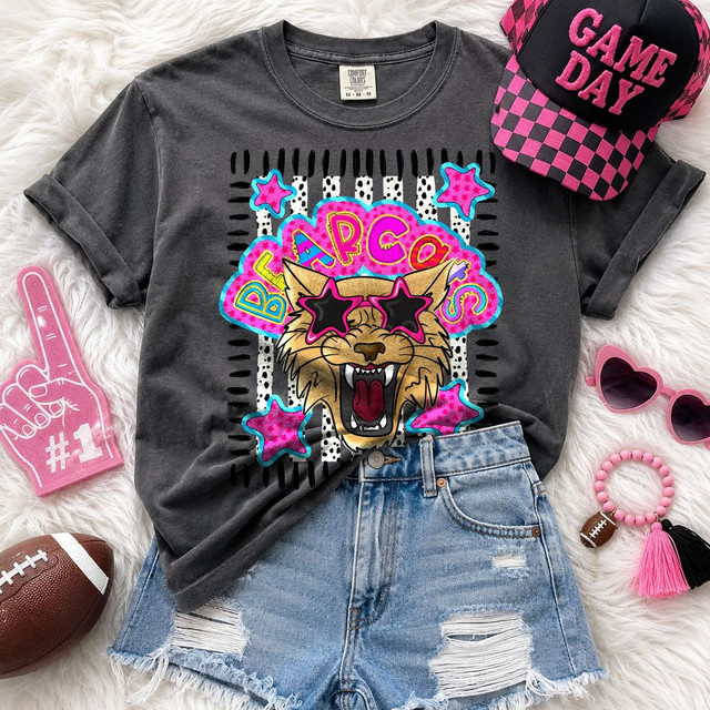 Bearcats mascot DTF transfer featuring a roaring bobcat face in pink star sunglasses with dotted star school spirit graphic style