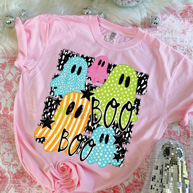 Boo Boo Patterned Ghosts Halloween DTF Transfer, colorful ghost design on a pink t-shirt.