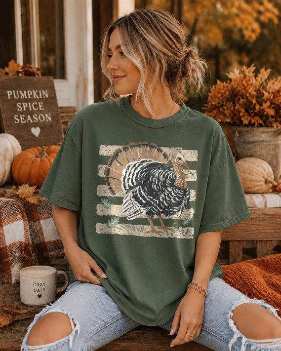 Striped turkey DTF transfer with distressed hand-painted design on a green t-shirt for Thanksgiving and fall apparel