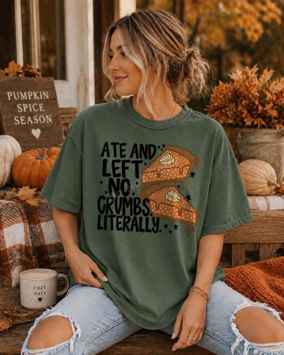 Ate and Left No Crumbs Literally DTF transfer with pumpkin pie slices and star accents on a green shirt