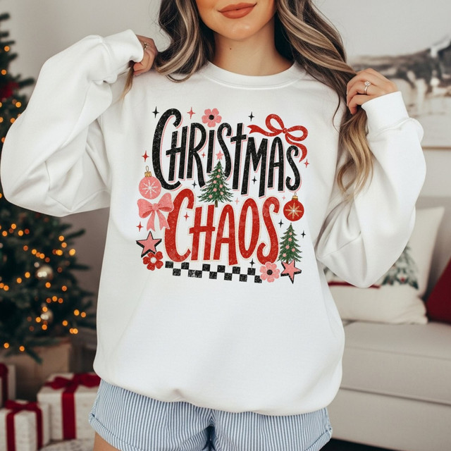 Christmas Chaos DTF transfer with retro black and red lettering, pink flowers, bows, ornaments, and Christmas trees over a checkered accent