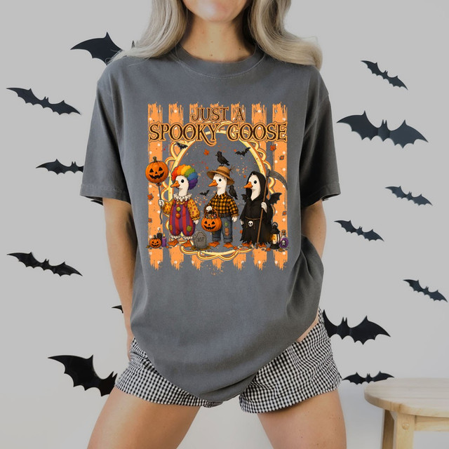Just A Spooky Goose Halloween DTF transfer featuring three geese dressed as a clown, scarecrow, and grim reaper with pumpkins and bats