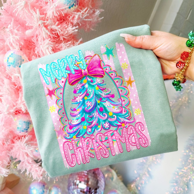 Merry Christmas DTF transfer with pastel pink and teal Christmas tree, glittery pink bow, and polka dot lettering