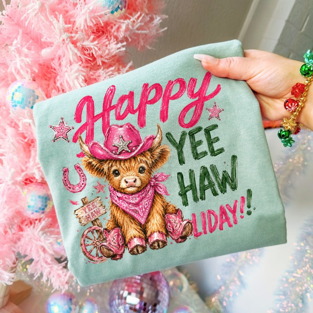 Happy Yee Haw Liday DTF transfer with pink cowboy hat highland cow wearing bandana and boots, western Christmas holiday design