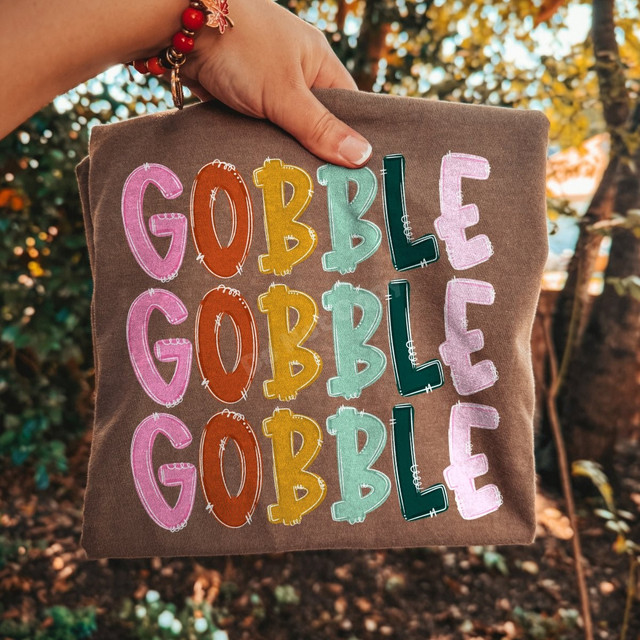 Gobble Gobble Gobble DTF transfer with retro stacked multicolor lettering in pink, rust, mustard, sage, and green