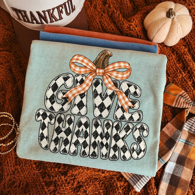 Give Thanks DTF transfer with black and white checkered bubble letters, pumpkin stem, and orange gingham bow design