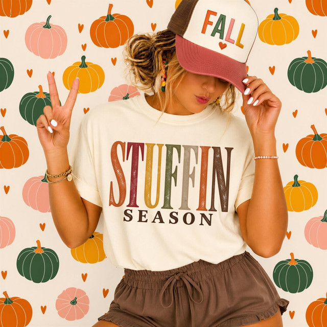 Stuffin' Season DTF transfer in distressed retro multicolor lettering on a cream t-shirt, Thanksgiving fall design