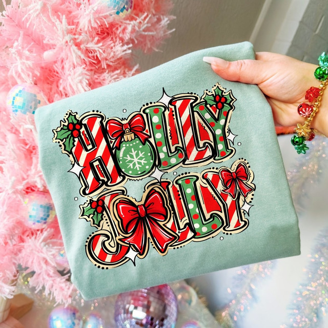 Holly Jolly Christmas DTF transfer with candy cane striped lettering, polka dot accents, holly berries, and red bows
