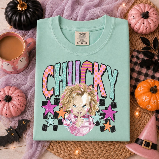 Chucky DTF transfer with colorful patterned bubble lettering, retro stars, and illustrated doll face shushing
