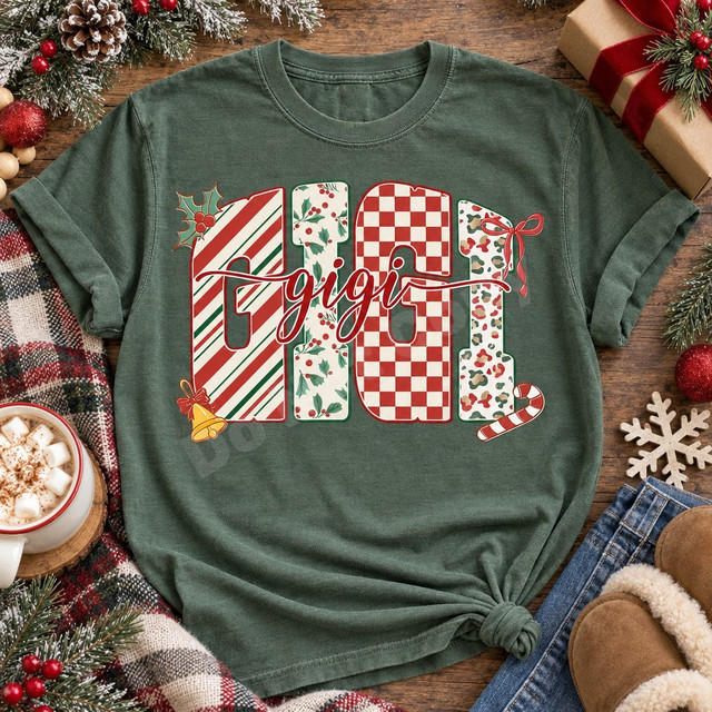 GIGI Christmas DTF transfer with chunky block letters in candy cane stripe, holly and berry, checkerboard, and leopard camo patterns, accented with holly, a jingle bell, and a candy cane, topped with red cursive gigi script Shown on a Moss t-shirt.
