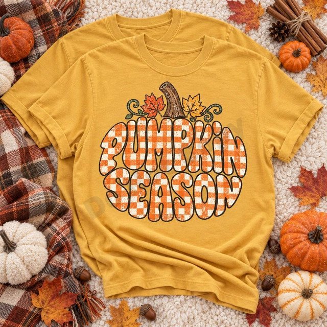 Pumpkin Season DTF Transfer | Gingham Pumpkin Fall Design, orange and white gingham “Pumpkin Season” lettering with a pumpkin stem and autumn leaves displayed on a mustard yellow T-shirt surrounded by fall pumpkins and leaves.